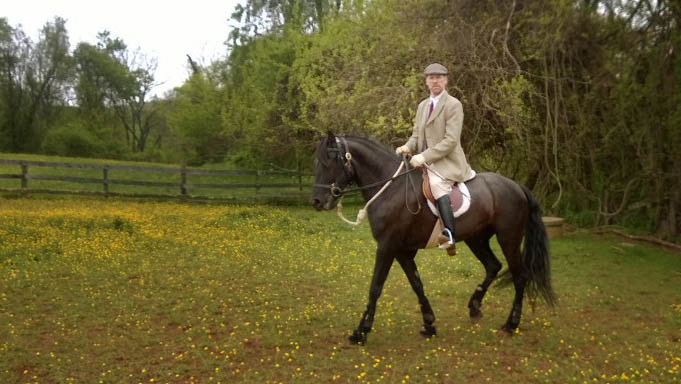 Peter Thos. Hansen riding on horseback in Fauquier County